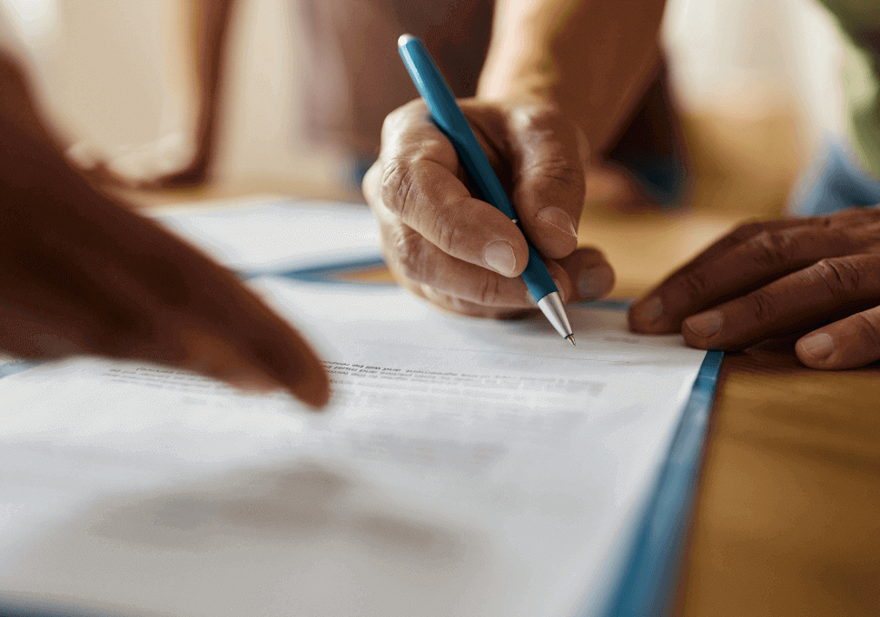 hand signing a document